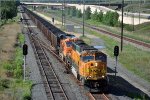 Loaded coal train rolls east